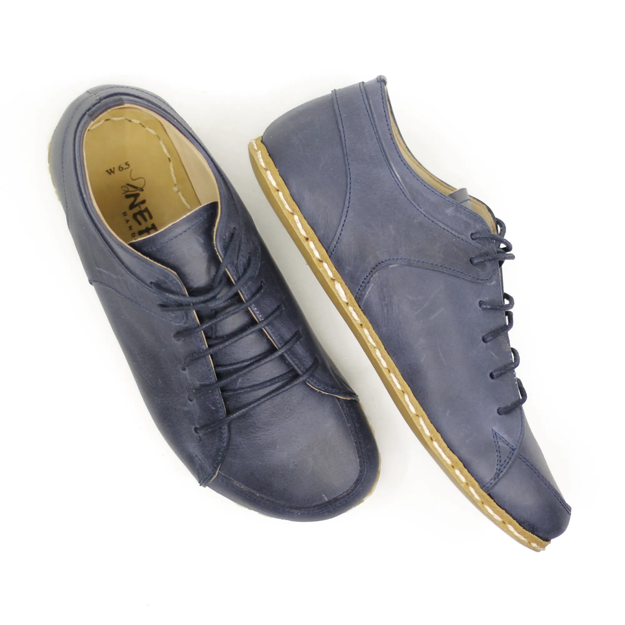 Men's Copper Rivet Earthing Leather Sneaker in Navy Blue